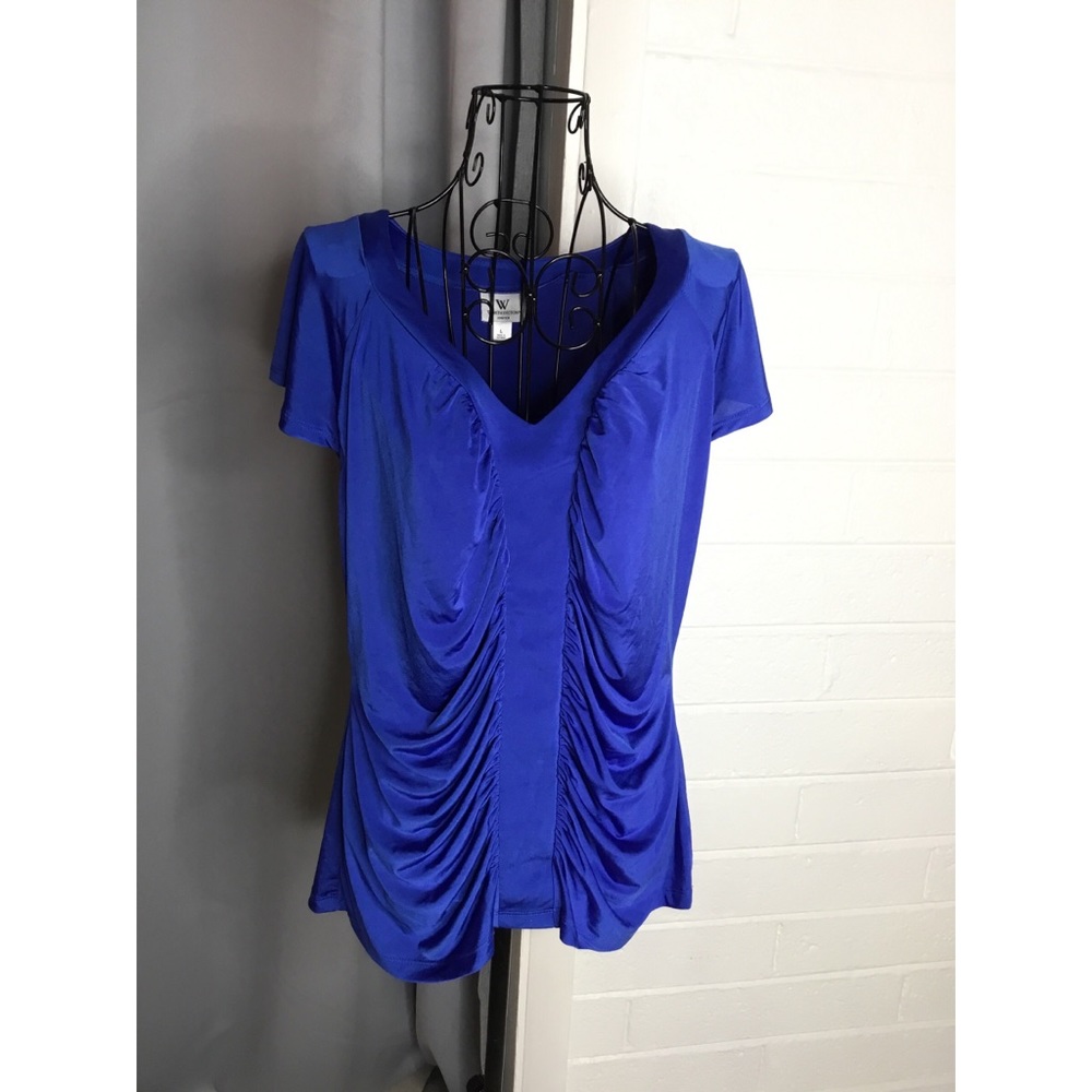 Very nice top. New like condition.